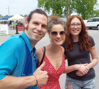 Songwriter Rich Tyo, partner Anoushka Moucessian, and Isabel Tyo at the Farmers Market